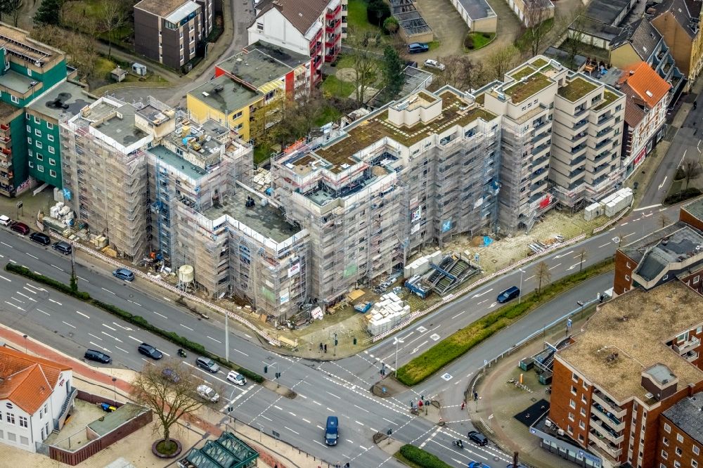 Herne from the bird's eye view: Construction site for the renovation and modernization of the high-rise buildings in the residential area Bochumer Strasse corner Sodinger Strasse in Herne at Ruhrgebiet in the state North Rhine-Westphalia, Germany
