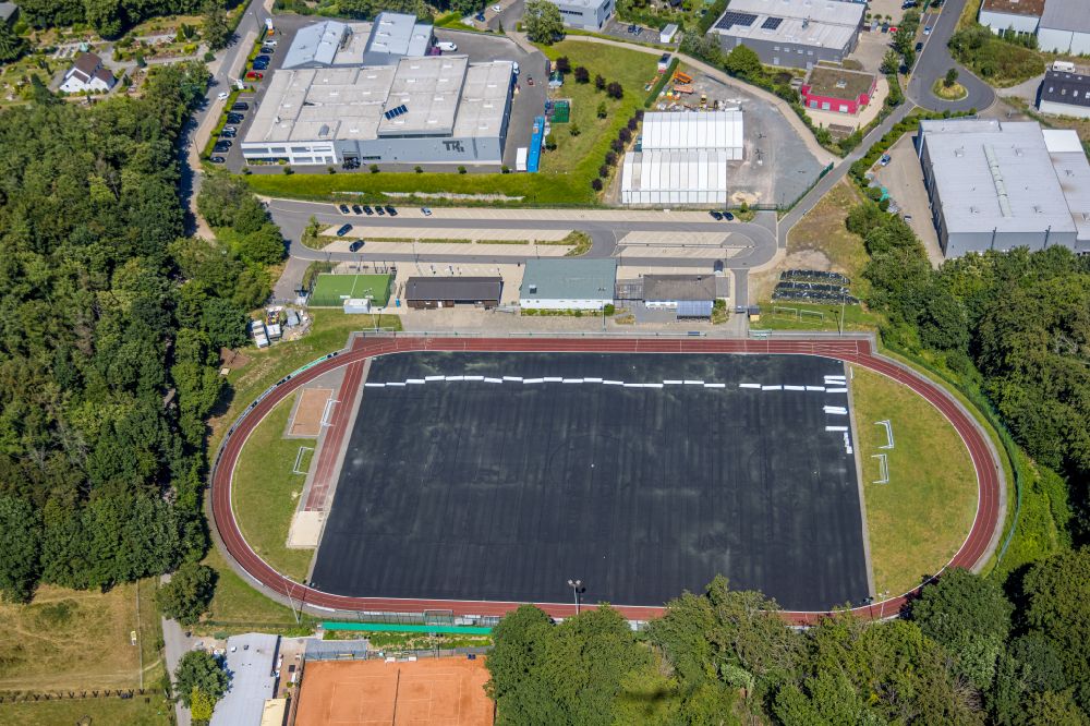 Silschede from the bird's eye view: Refurbishment of the artificial turf in the Waldstadion on the street Am Waldesrand in Silschede in the state North Rhine-Westphalia, Germany