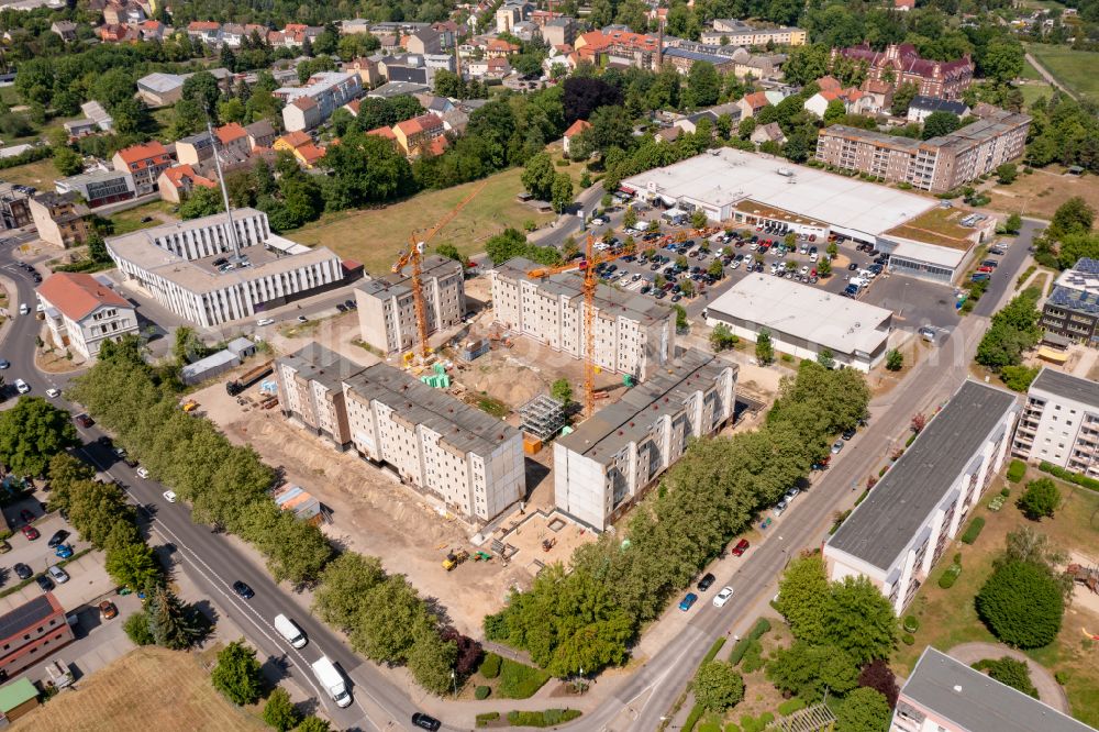 Luckenwalde from the bird's eye view: Restoration and modernization of skyscrapers in the residential area of industrially manufactured settlement Quartier Die Burg in Luckenwalde in the state Brandenburg, Germany