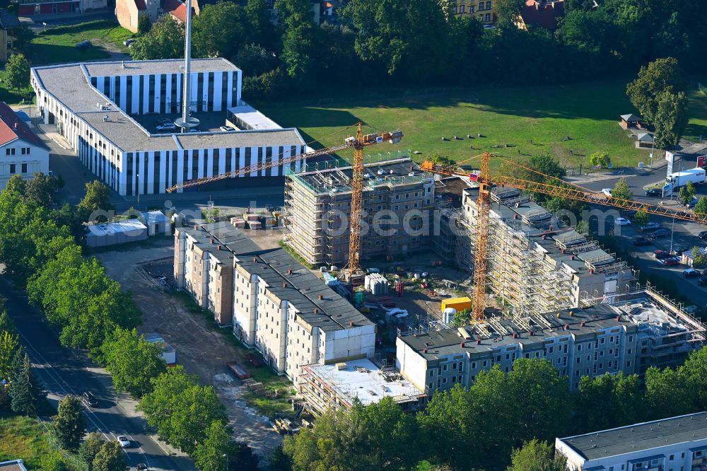 Luckenwalde from the bird's eye view: Restoration and modernization of skyscrapers in the residential area of industrially manufactured settlement Quartier Die Burg in Luckenwalde in the state Brandenburg, Germany