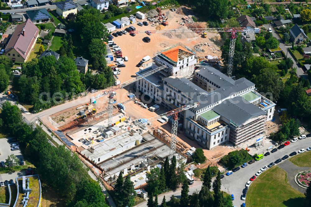 Aerial photograph Chemnitz - Construction site for the renovation of the building of the event hall Kulturpalast Rabenstein (formerly Kulturpalast der Bergarbeiter) for conversion for residential purposes on Unritzstrasse in the district Reichenbrand in Chemnitz in the state Saxony, Germany