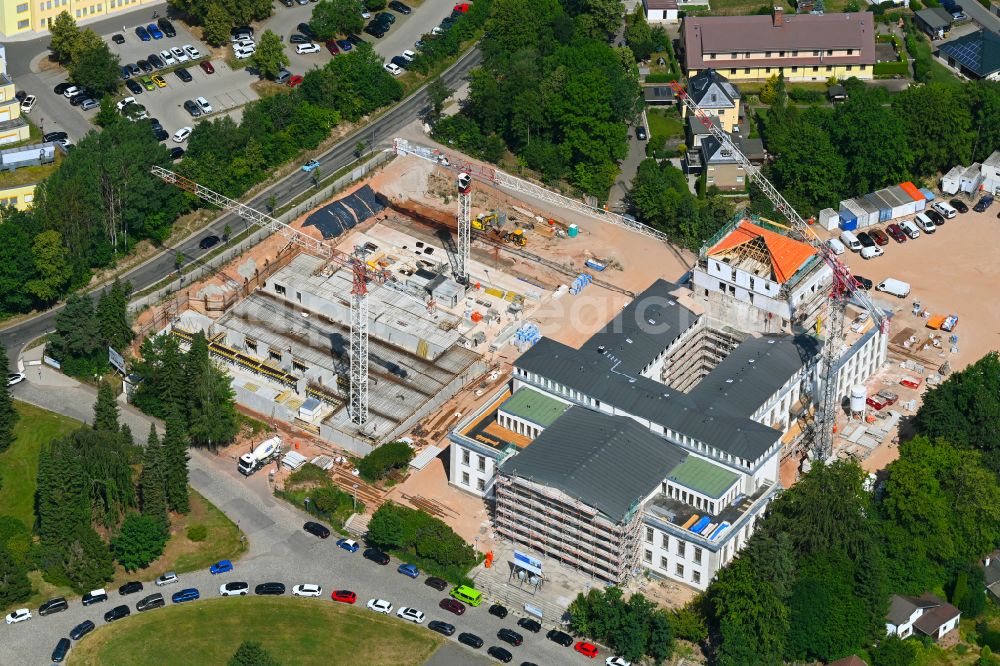 Aerial image Chemnitz - Construction site for the renovation of the building of the event hall Kulturpalast Rabenstein (formerly Kulturpalast der Bergarbeiter) for conversion for residential purposes on Unritzstrasse in the district Reichenbrand in Chemnitz in the state Saxony, Germany