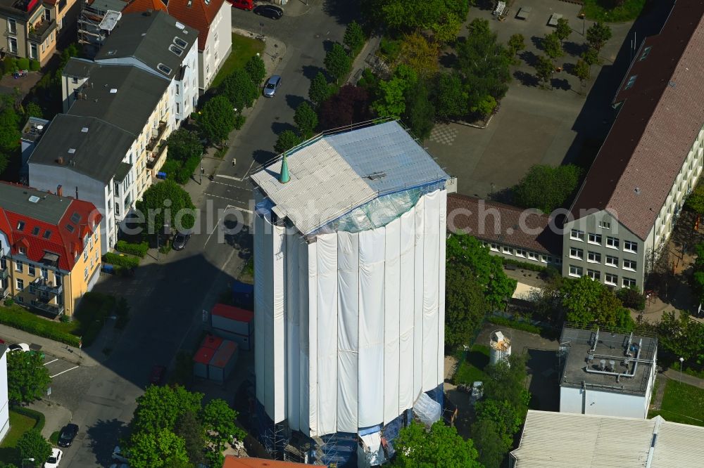 Rostock from above - Construction site Tourist attraction of the historic monument of Wasserturm on Bluecherstrasse in Rostock in the state Mecklenburg - Western Pomerania, Germany