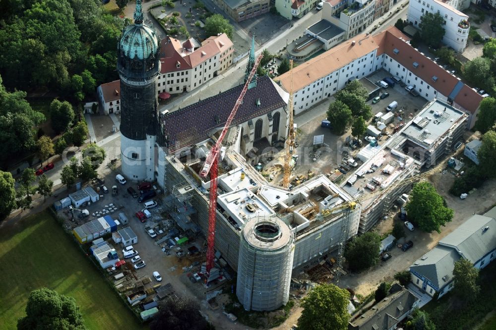 Lutherstadt Wittenberg from the bird's eye view: View of the castle church of Wittenberg. The castle with its 88 m high Gothic tower at the west end of the town is a UNESCO World Heritage Site. It gained fame as the Wittenberg Augustinian monk and theology professor Martin Luther spread his disputation