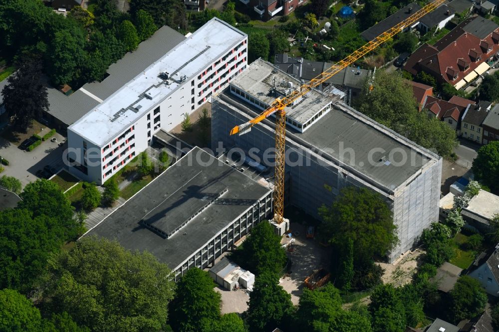 Lübeck from above - Construction site for the rehabilitation of the District Court Luebeck Am Burgfeld in Luebeck in the state of Schleswig-Holstein, Germany