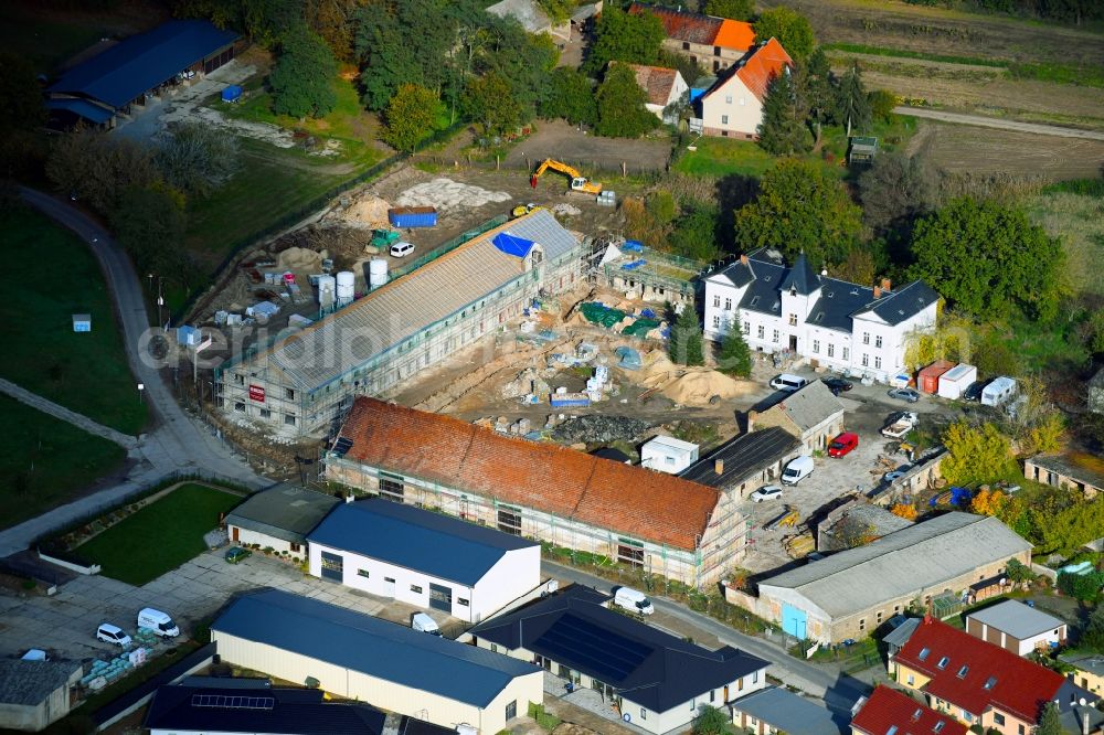Aerial photograph Klein Kreutz - Constuction site and renovation works on building and manor house of the farmhouse in Klein Kreutz in the state Brandenburg, Germany