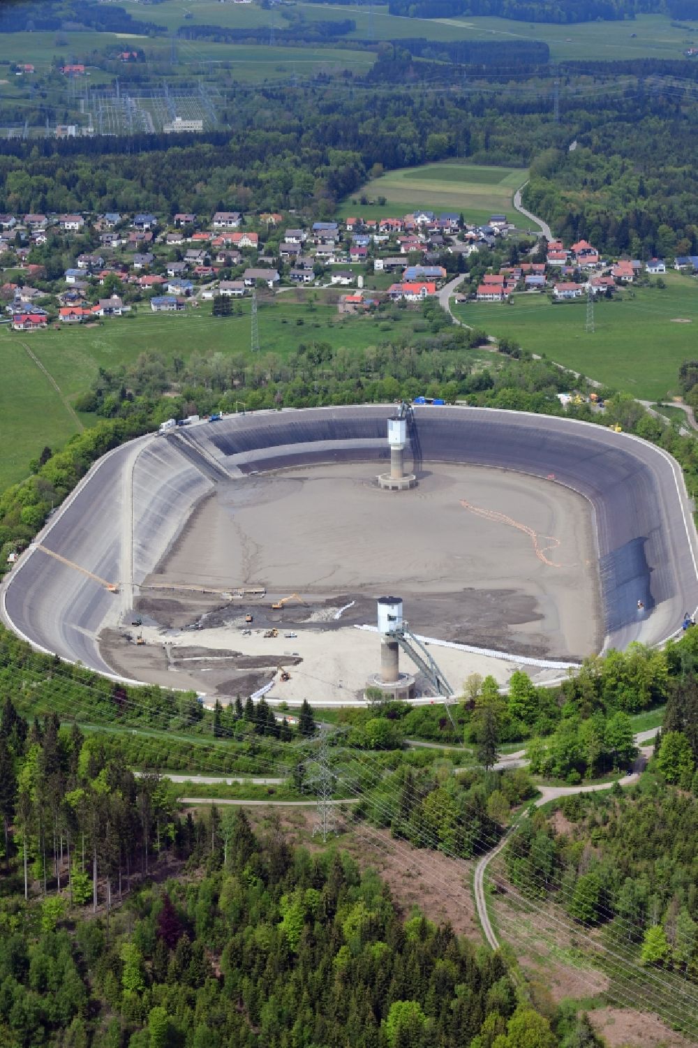 Rickenbach from the bird's eye view: High storage reservoir Eggbergbecken in the district Egg of the village Rickenbach in the state Baden-Wurttemberg, Germany is rehabbed and cleaned. Situated on the high plateau of the Hotzenwald in the Black Forest