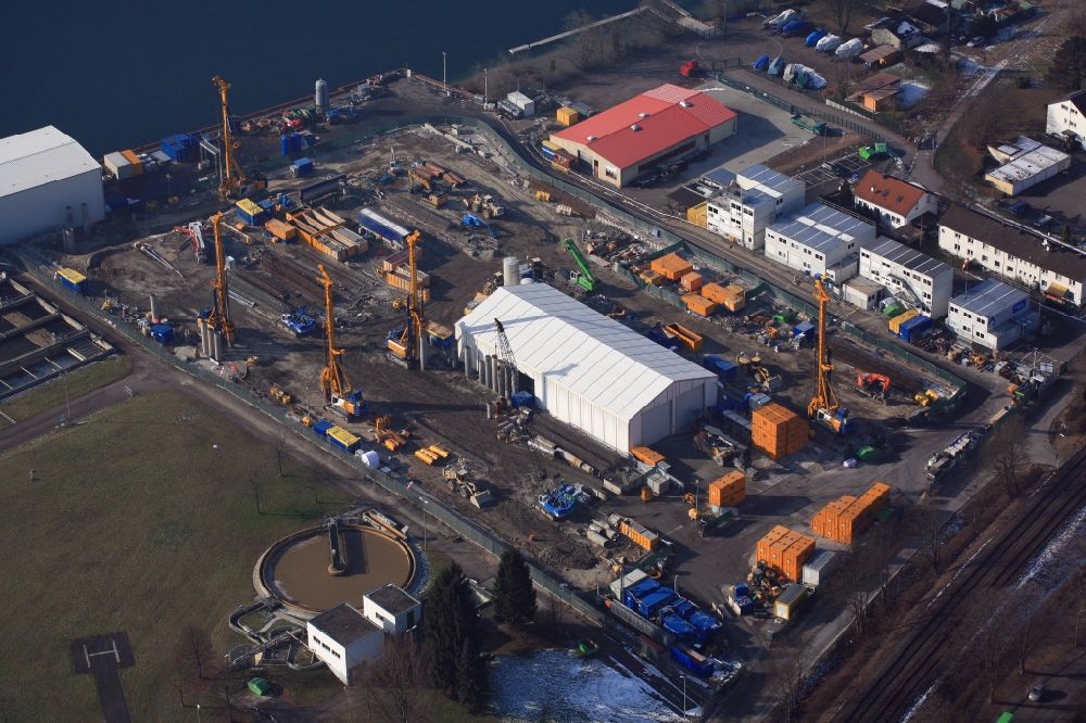 Aerial image Grenzach-Wyhlen - Remediation at the site of the former wastewater treatment plant of the pharmaceutical company Roche in Grenzach-Wyhlen in Baden -Wuerttemberg. The temporary landing stage on the river Rhine is used for the removal of the excavated material