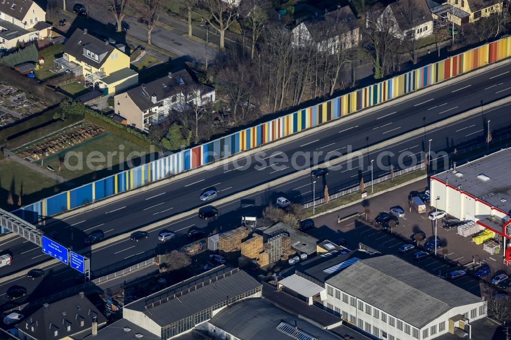 Bochum from above - Colorful noise protection wall on the edge of the motorway route of the BAB A40 near in the district of Westenfeld in Bochum in the Ruhr area in the state North Rhine-Westphalia, Germany