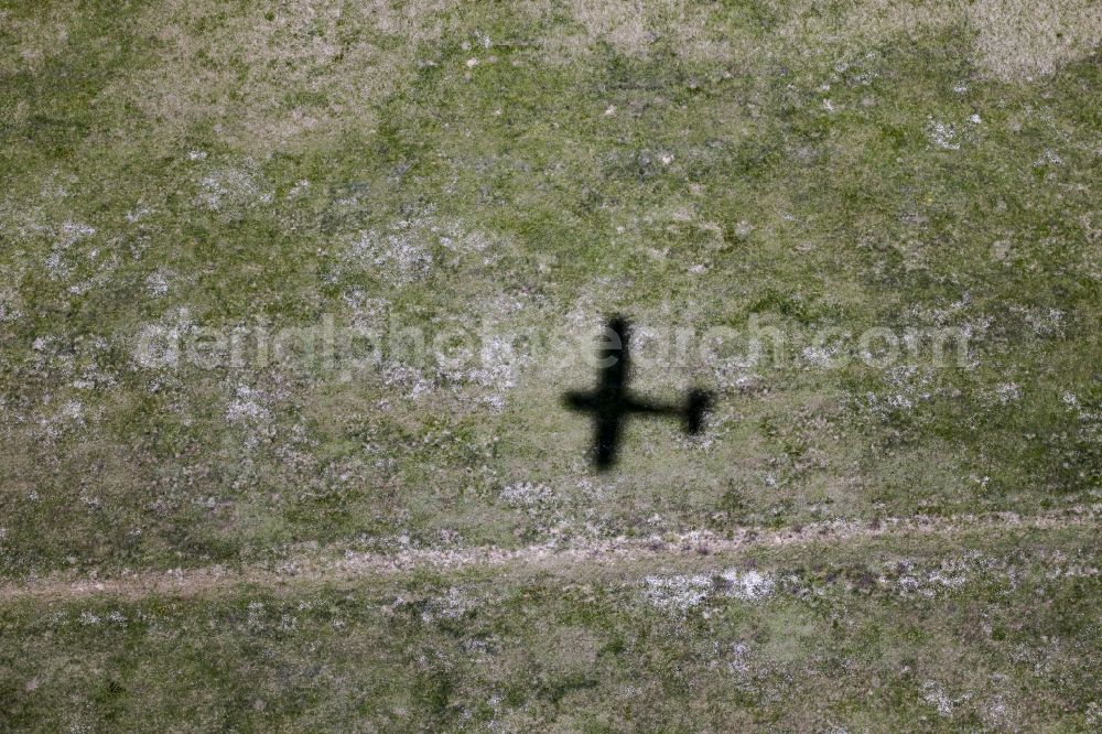 Werneuchen from above - Shadow of the Cessna 172 D-EGYC of euroluftbild.de on grass at the airfield in Werneuchen in the state of Brandenburg