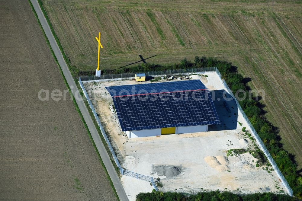 Aerial photograph Hausen - Barn building on the edge of agricultural fields and farmland with yellow cross in Hausen in the state Bavaria, Germany