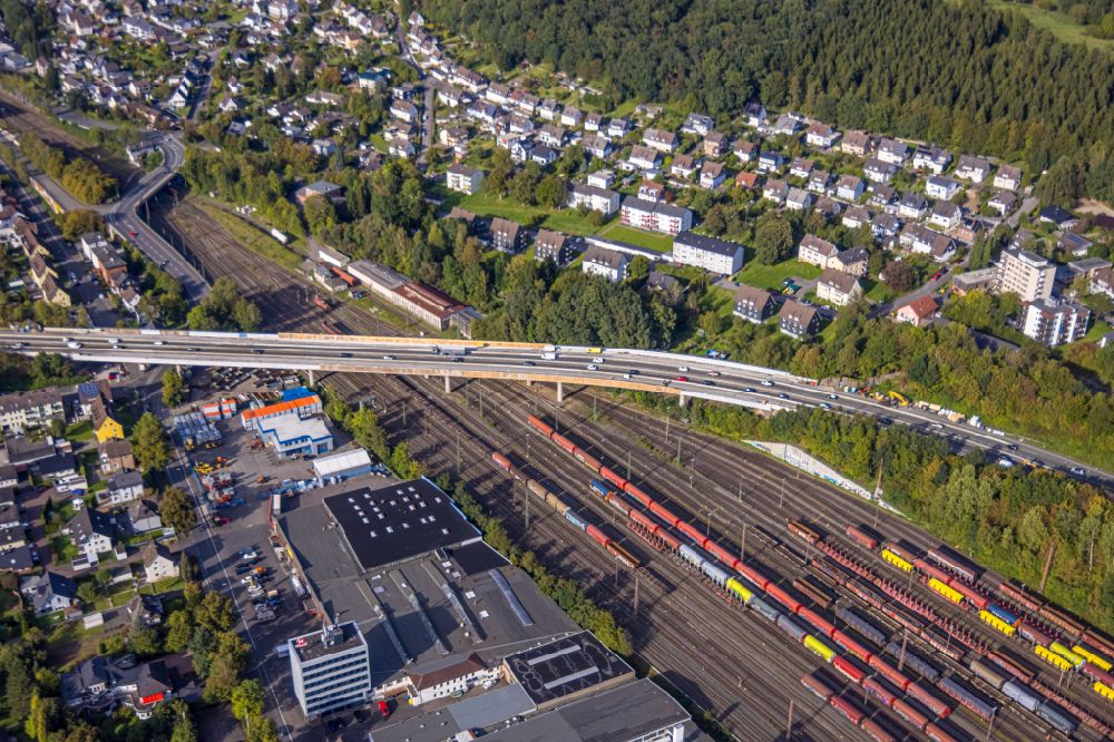 Aerial image Kreuztal - Railway track and overhead wiring harness in the route network of the Deutsche Bahn in the district Buchen on Huettentalstrasse in Kreuztal in the state North Rhine-Westphalia, Germany
