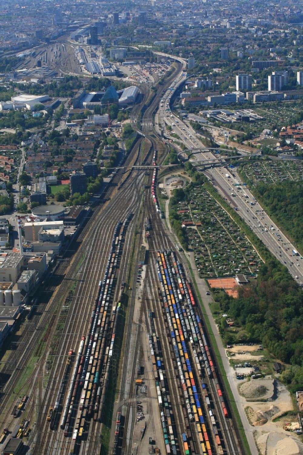 Muttenz from above - Railway tracks and cargo trains in the route network of the Swiss Railway SBB in Muttenz in the canton Basel-Landschaft, Switzerland
