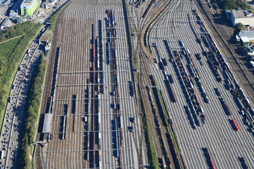 Aerial image Muttenz - Railway tracks and cargo trains in the route network of the Swiss Railway SBB in Muttenz in the canton Basel-Landschaft, Switzerland