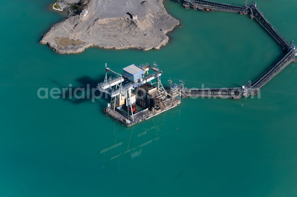 Aerial image Singen (Hohentwiel) - Ship - specialized vessel in driving on the quarry pond of the gravel pit in Singen (Hohentwiel) in the state Baden-Wuerttemberg, Germany