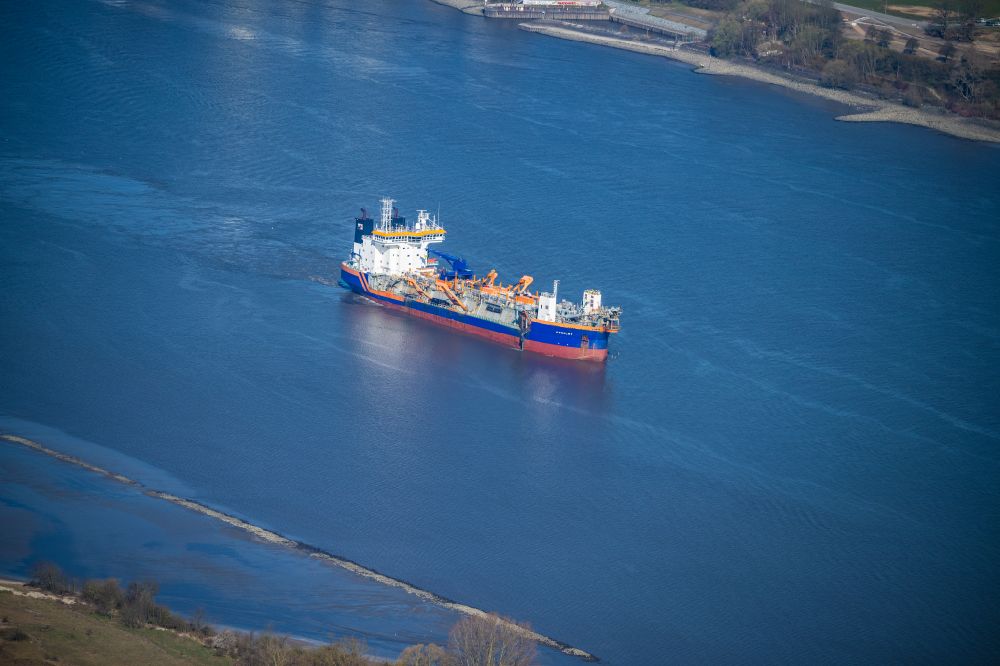 Wedel from above - Ship - special ship of the suction dredger Utrecht ( IMO: 9125956, MMSI: 245601000 ) in motion on the Elbe in Wedel in the state Schleswig-Holstein, Germany