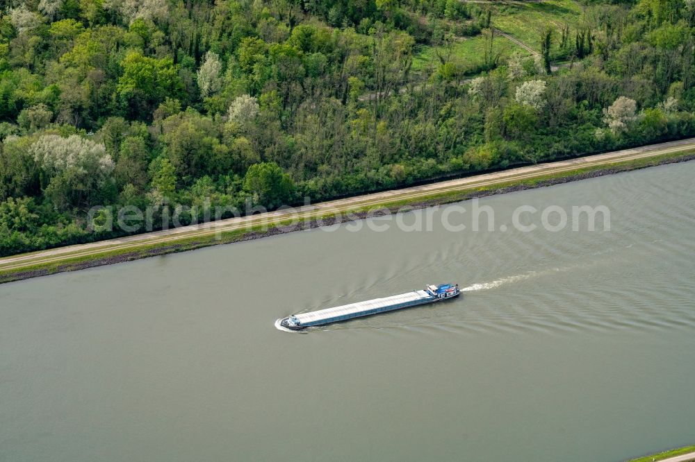 Aerial photograph Diebolsheim - Ships and barge trains inland waterway transport in driving on the waterway of the river Rhine in Diebolsheim in Grand Est, France