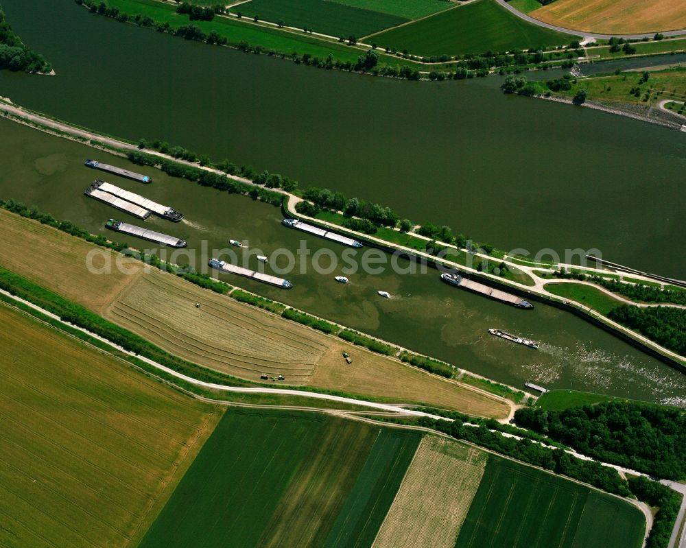 Straubing from above - Ships and boats in the lock systems on the banks of the Danube waterway in the district Kagers in Straubing in the state Bavaria, Germany