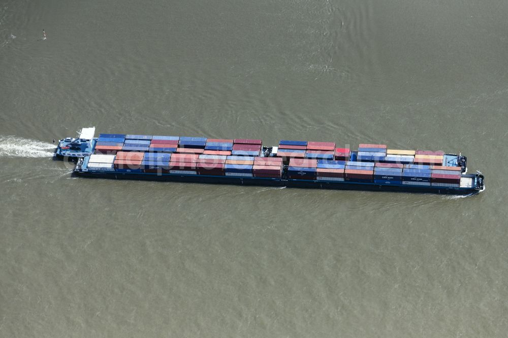Aerial image Königswinter - Ships and barge trains inland waterway transport in driving on the waterway of the river in Koenigswinter in the state North Rhine-Westphalia, Germany