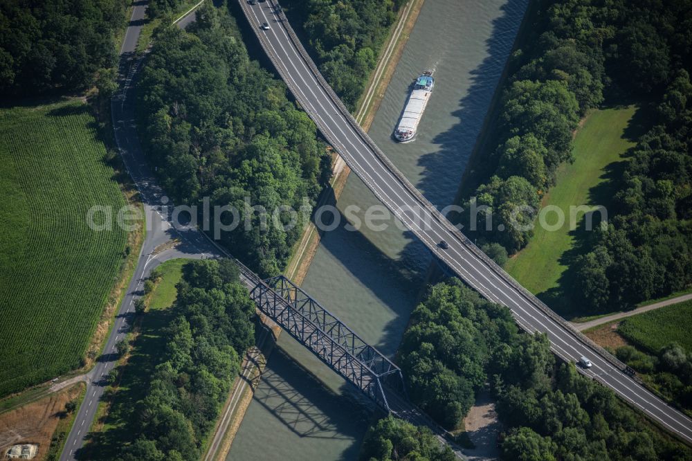 Braunschweig from above - Ships and barge trains inland waterway transport in driving on the waterway of the river Mittellandkanal in Brunswick in the state Lower Saxony, Germany