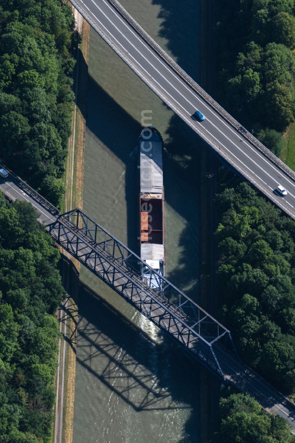 Aerial image Braunschweig - Ships and barge trains inland waterway transport in driving on the waterway of the river Mittellandkanal in Brunswick in the state Lower Saxony, Germany