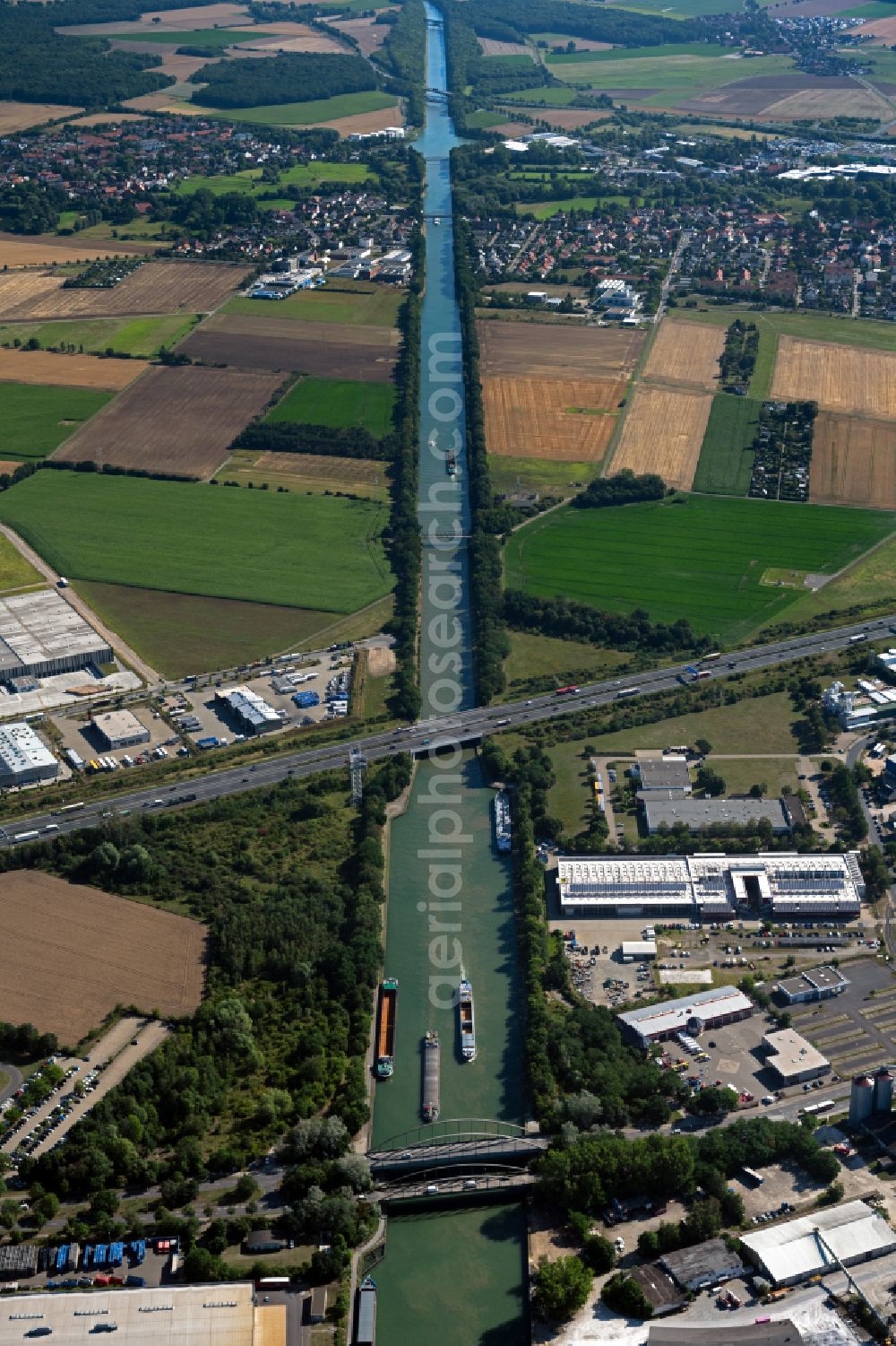Aerial image Braunschweig - Ships and barge trains inland waterway transport in driving on the waterway of the river Mittellandkanal in Brunswick in the state Lower Saxony, Germany