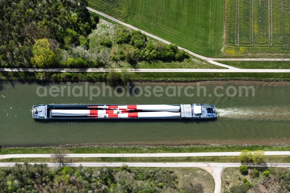 Aerial image Bamberg - Ships and barge trains inland waterway transport in driving on the waterway of the river of Regnitz beladen with grossen Windrad Blaettern in Bamberg in the state Bavaria, Germany