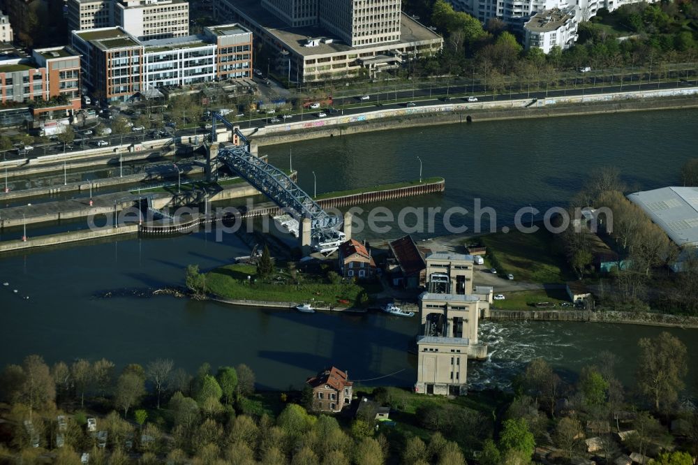 Suresnes from above - Locks - plants on the banks of the waterway of the Senne in Suresnes in Ile-de-France, France
