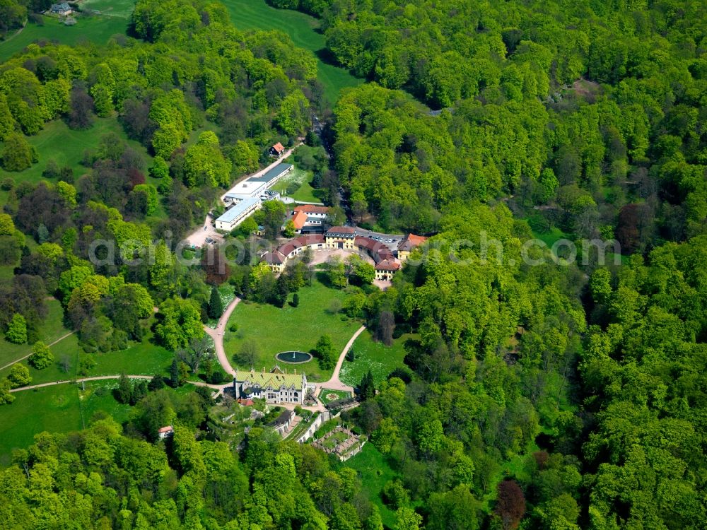 Bad Liebenstein from the bird's eye view: Castle Altenstein and the Altenstein Park in the Altenstein part of Bad Liebenstein in the state of Thuringia. The castle and the park have been in existence since the 18th century. The baroque style castle was summer residence and is located in the nature park Thuringian Forest