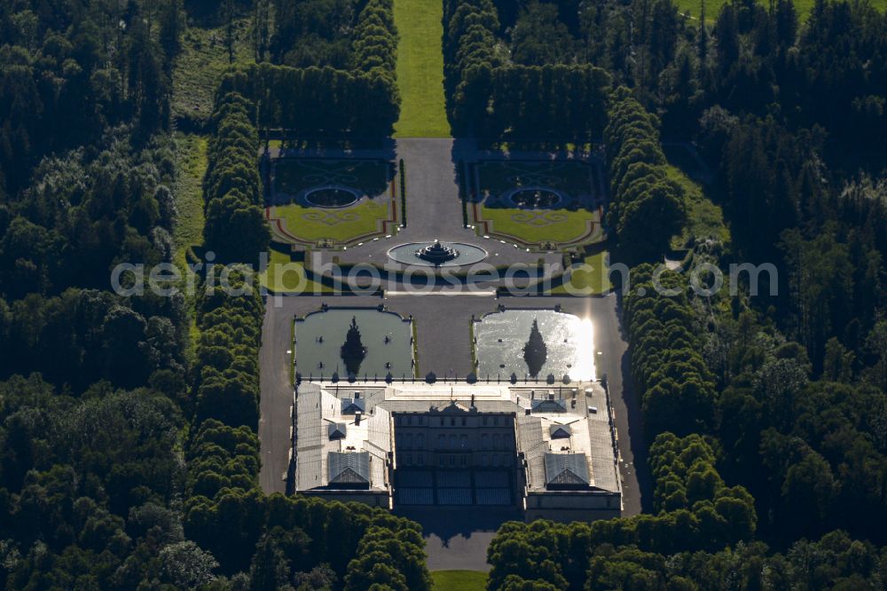 Chiemsee from above - New Palace Herrenchiemsee with building complex and palace park on the island of Herrenchiemsee in the state Bavaria, Germany