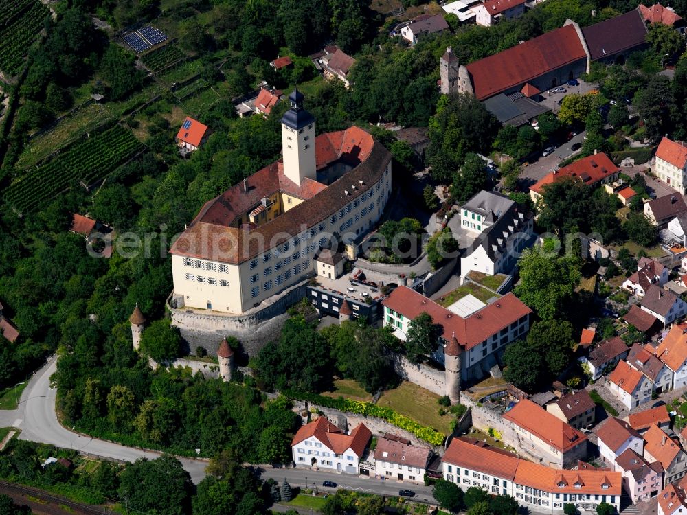 Aerial photograph Gundelsheim - Castle Horneck in Gundelsheim in the state of Baden-Württemberg. The building was originally a fortress overlooking the river Neckar. It was then used as a monastery and finally refurbished in the 18th century and converted to a baroque style castle. Today it is used by the Transylvanian Saxons