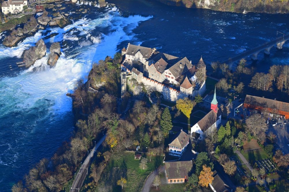 Neuhausen am Rheinfall from the bird's eye view: Natural spectacle of the waterfall and Castle Laufen in the rocky landscape Rheinfall in Neuhausen am Rheinfall in the canton Schaffhausen, Switzerland