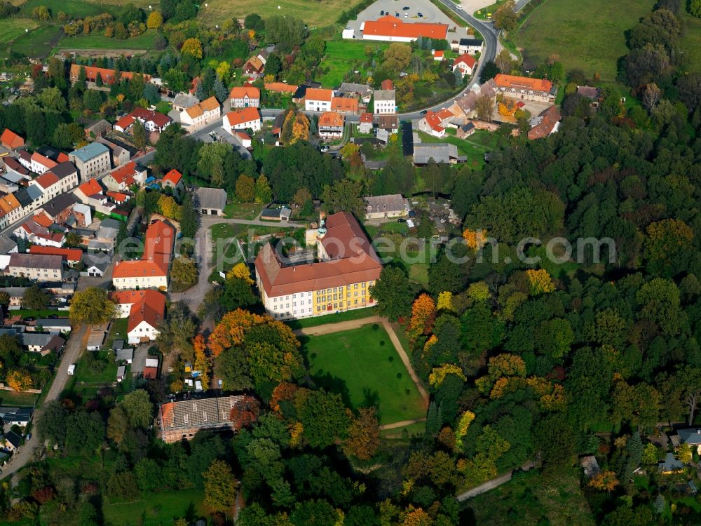 Aerial photograph Lieberose - Lieberose Castle in the city of Lieberose in the state of Brandenburg. The castle and its park are tourist attractions of the city. It is located within a garden compound at the outskirts of the city, enclosed by residential buildings and historical buildings