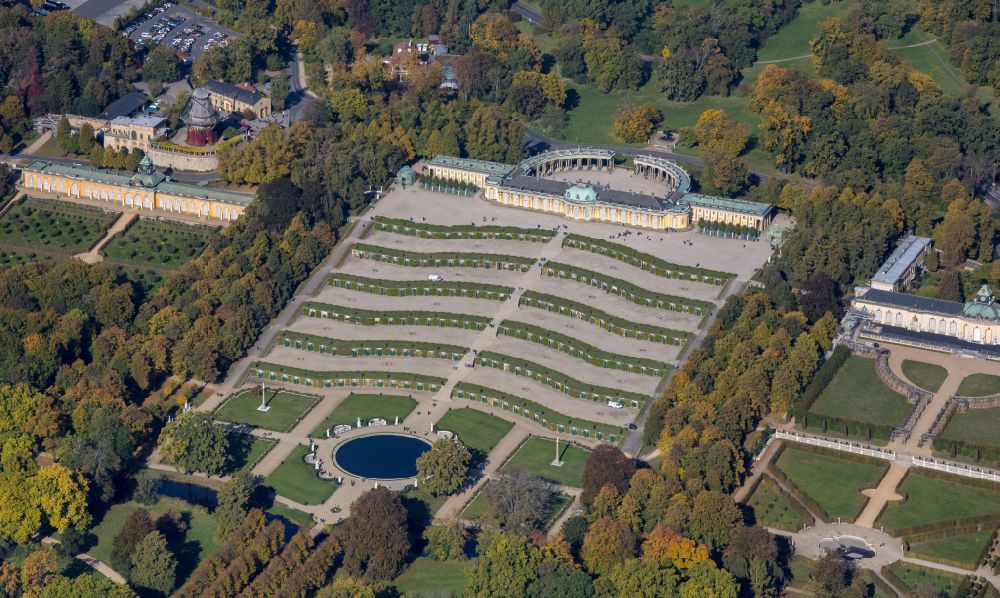 Potsdam from above - Sanssouci Palace in Potsdam in Brandenburg. The Sanssouci Palace in the eastern part of the park of the same name is one of the most famous castles of Hohenzollern. The palaces and gardens are world heritage and under UNESCO protection