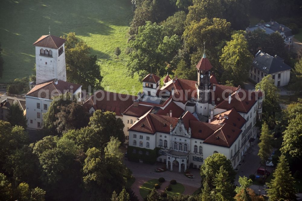 Waldenburg from the bird's eye view: Castle Waldenburg in Waldenburg in the state of Saxony. The castle with its castle keep is surrounded by forest and located on a hill in the Southeast of Waldenburg