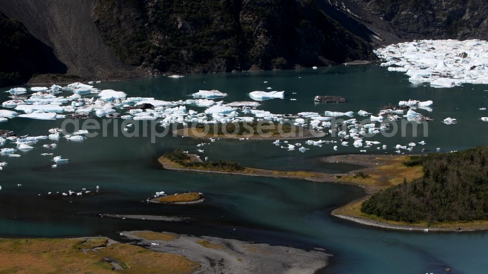 Kenai Fjords National Park from the bird's eye view: Melting glaciers remnants of Aialik Glacier floating in glacier lake in Kenai Fjords National Park on the Kenai Peninsula in Alaska in the United States of America USA