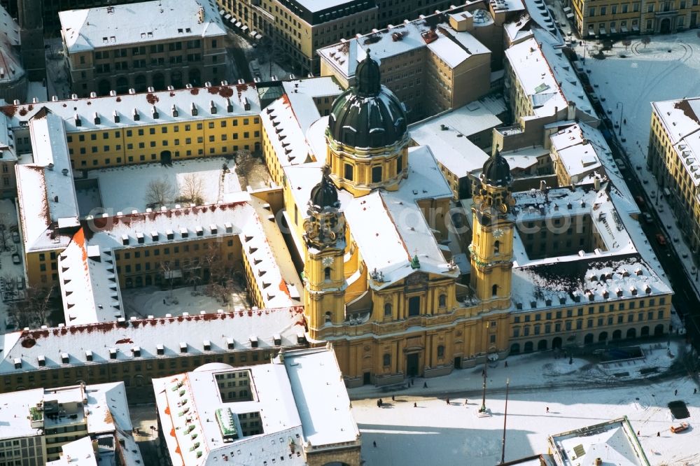 München from above - Wintry snowy church building in the Theatinerkirche also Catholic Collegiate Church of St. Cajetan called in Munich in Bavaria