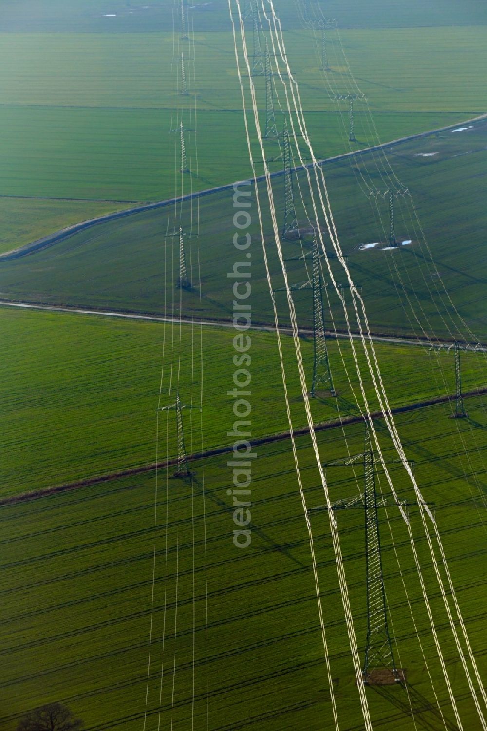 Wansdorf from the bird's eye view: Current route of the power lines and pylons in Wansdorf in the state Brandenburg, Germany