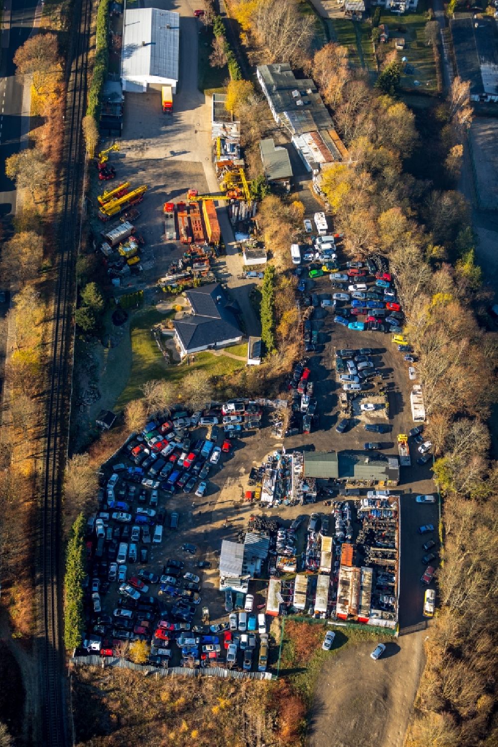 Lüdenscheid from above - Scrapyard for recycling of cars cars and used vehicles with decomposition and aftermarket of AVL - Autoverwertung Luedenscheid GmbH on Dammstrasse in Luedenscheid in the state North Rhine-Westphalia, Germany