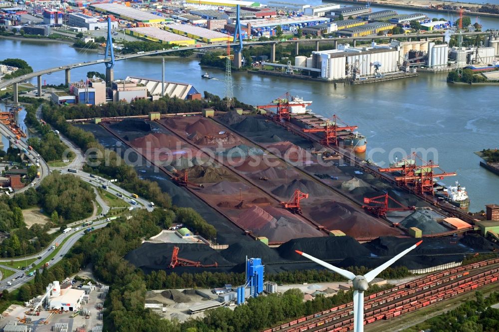 Aerial image Hamburg - Wharves and jetties marine inland waterway with loading of building materials, coal, earth, gravel, stones or other materials in the inner harbor in the district Altenwerder in Hamburg, Germany