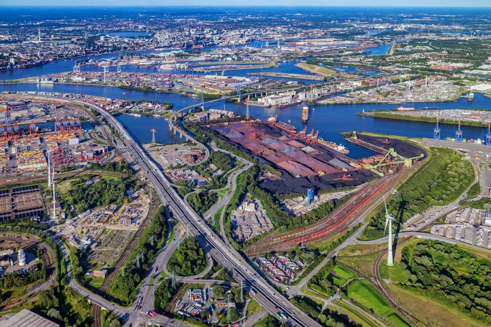 Hamburg from above - Wharves and jetties marine inland waterway with loading of building materials, coal, earth, gravel, stones or other materials in the inner harbor in the district Altenwerder in Hamburg, Germany