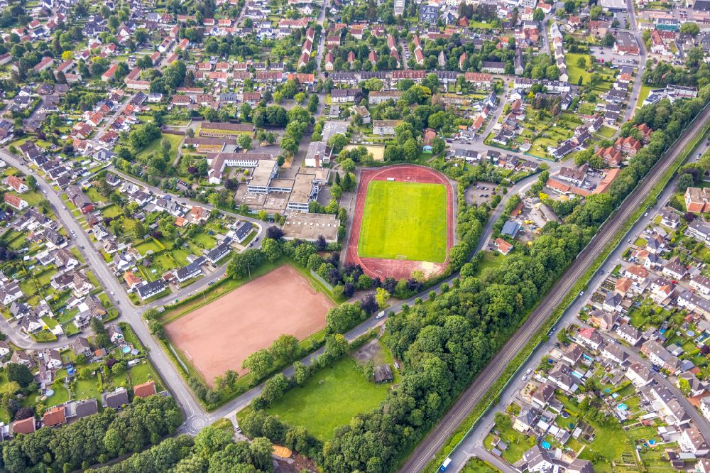 Bönen from above - School building of the Humboldt-Realschule and the Marie-Curie-Gymnasium with sports field on Billy-Montigny-Platz in Boenen in the state North Rhine-Westphalia, Germany