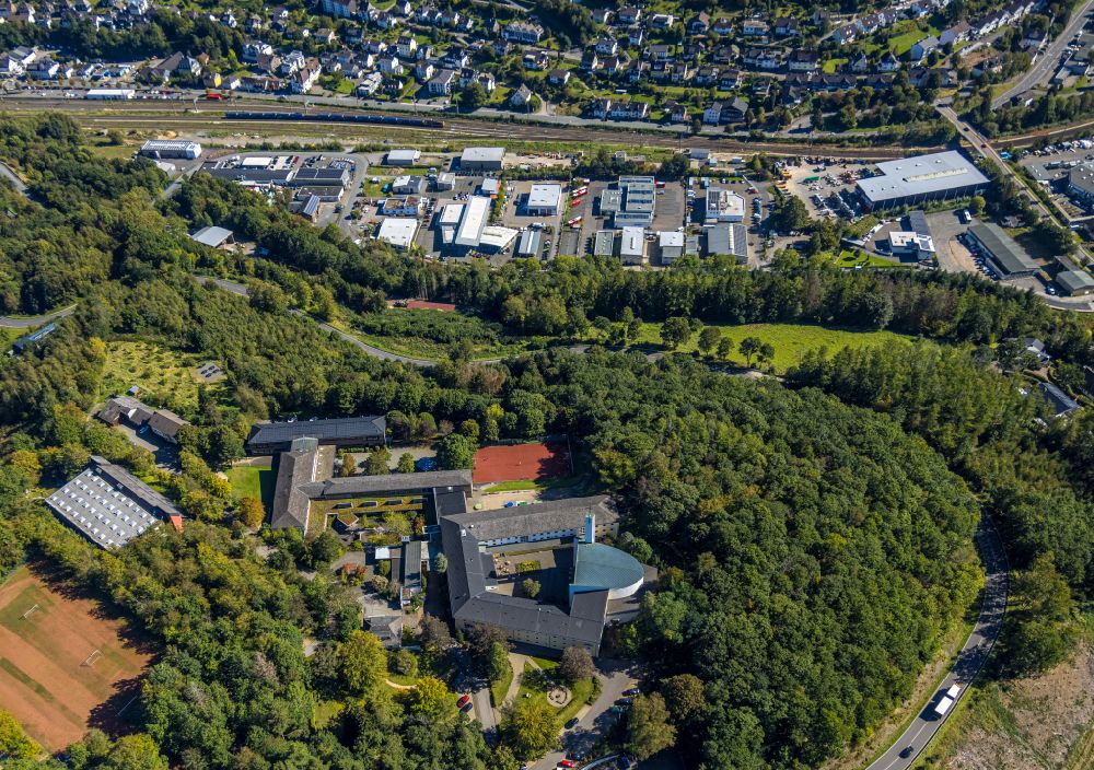 Lennestadt from the bird's eye view: School building of the Wolfgang Gerbere school of the Gymnasium Maria Koenigin and the building complex of the Jugendhof Pallotti Lennestadt on Missionshaus in the district Altenhundem in Lennestadt in the state North Rhine-Westphalia, Germany