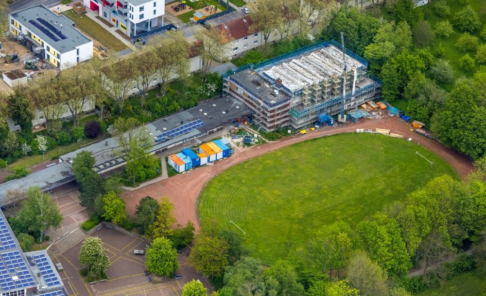 Aerial image Herne - School building and sports field of Otto-Hahn-Gymnasium Herne with renovation work on the swimming pool on Hoelkeskampring in Herne at Ruhrgebiet in the state North Rhine-Westphalia, Germany