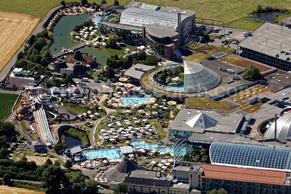 Aerial photograph Erding - Spa, Swimming pools and water slides at the indoor and outdoor pools of the Therme Erding in the state Bavaria. Glass roof and metal domes are open and allow a view of the slide paradise Galaxy, indoor pool, wave pool, vitality oasis and other wellness areas