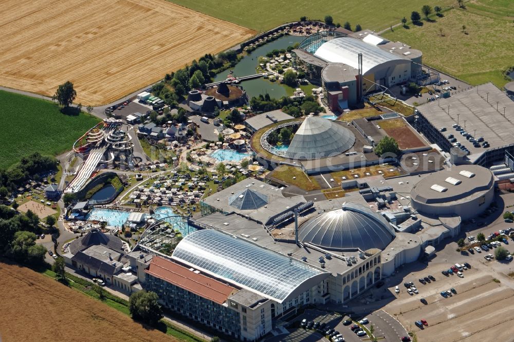 Erding from above - Spa, Swimming pools and water slides at the indoor and outdoor pools of the Therme Erding in the state Bavaria. Glass roof and metal domes are open and allow a view of the slide paradise Galaxy, indoor pool, wave pool, vitality oasis and other wellness areas