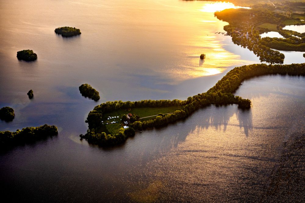 Aerial image Plön - Sea island on the Grosser Ploener See in Ploen in the evening light in the state of Schleswig-Holstein