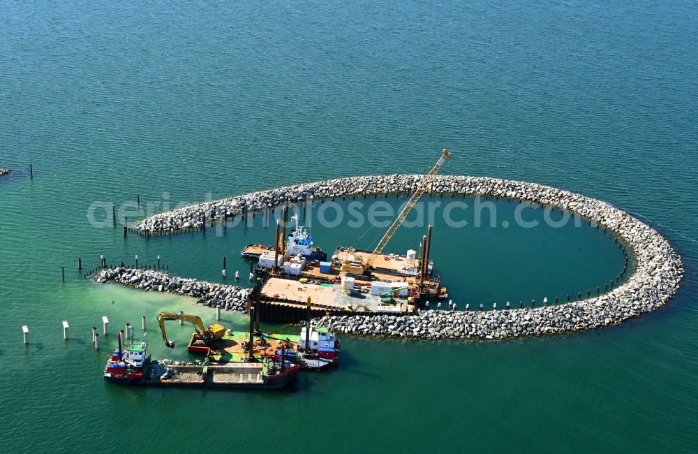 Prerow from the bird's eye view: Construction site for the new construction of a pier for crossing the coastal water and connecting the island port on the Baltic Sea in Prerow in the state Mecklenburg-West Pomerania, Germany