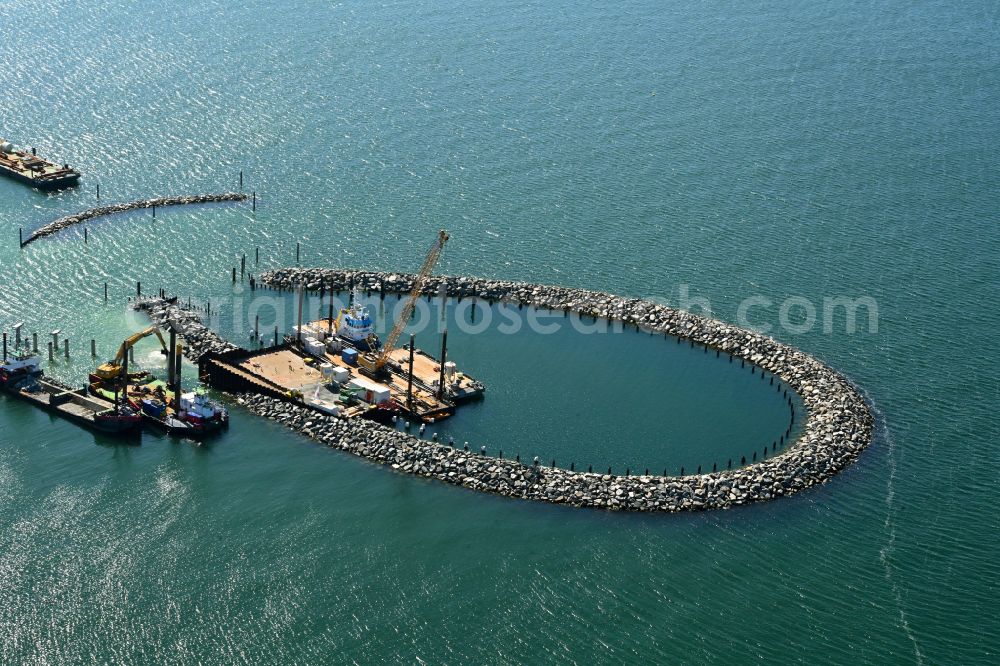 Prerow from the bird's eye view: Construction site for the new construction of a pier for crossing the coastal water and connecting the island port on the Baltic Sea in Prerow in the state Mecklenburg-West Pomerania, Germany