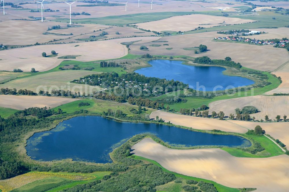 Dobberzin from above - Waterfront landscape on the lake Dobberzinersee in Dobberzin in the state Brandenburg, Germany